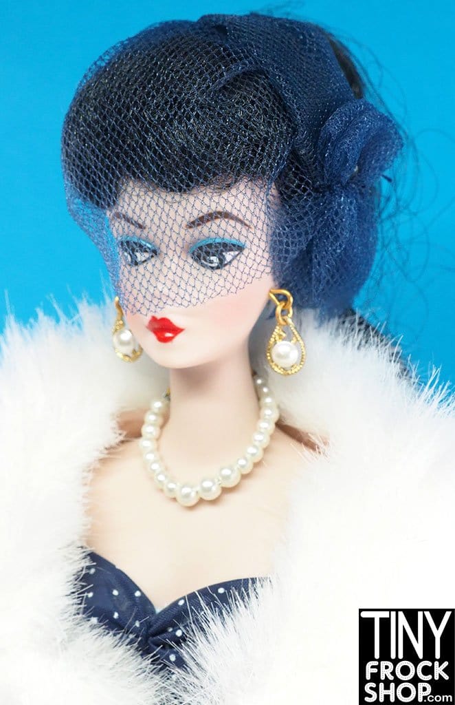 Barbie® Gay Parisian Porcelain Doll